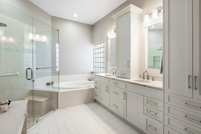 bathroom with vanity, tile patterned floors, and separate shower and tub