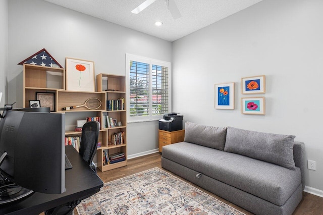 office space with hardwood / wood-style floors, a textured ceiling, and ceiling fan