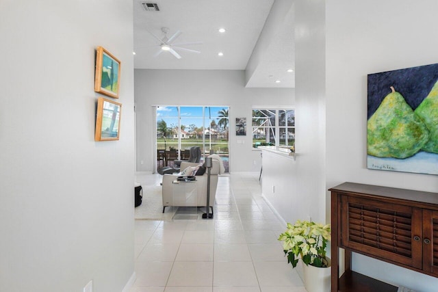 hallway featuring light tile patterned floors