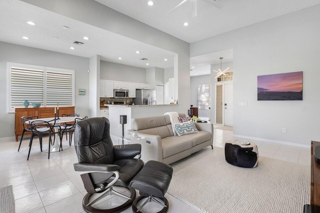 living room with light tile patterned flooring