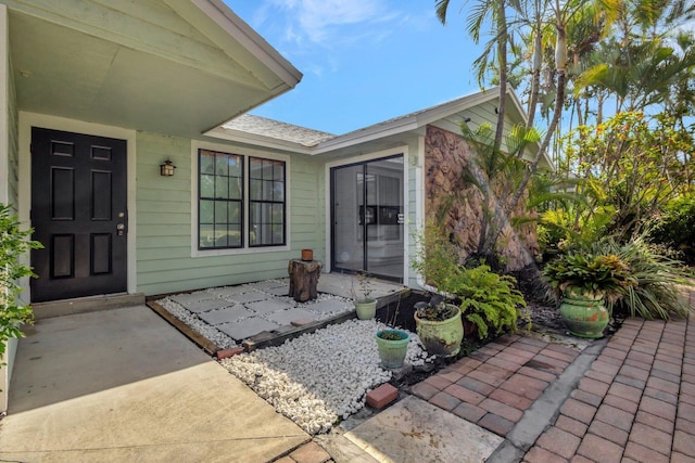 doorway to property featuring a patio area