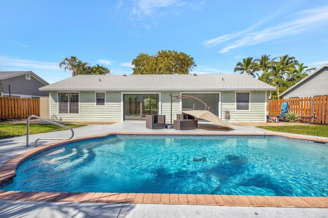 view of swimming pool featuring a patio