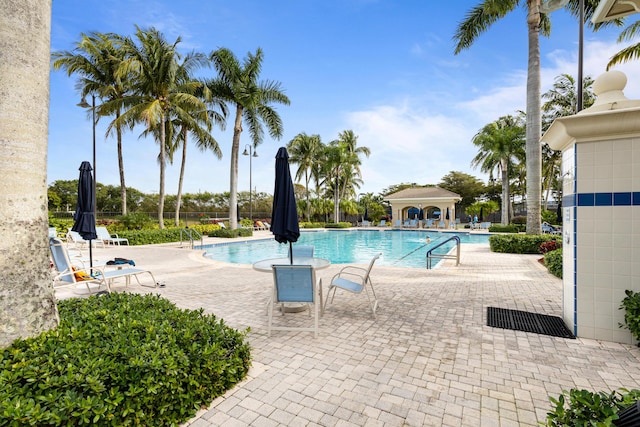 community pool featuring a patio area