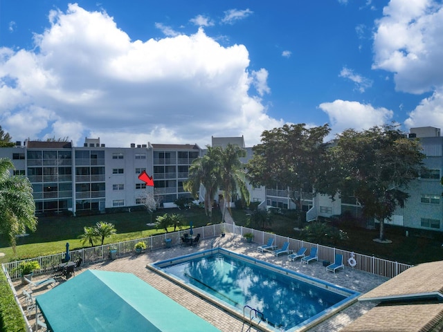 view of swimming pool featuring a patio