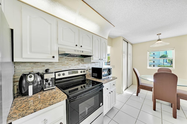 kitchen with electric stove, hanging light fixtures, tasteful backsplash, white cabinets, and dark stone counters