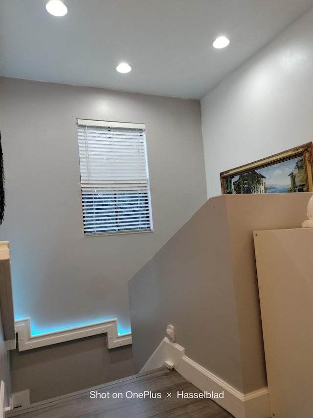 staircase featuring hardwood / wood-style flooring