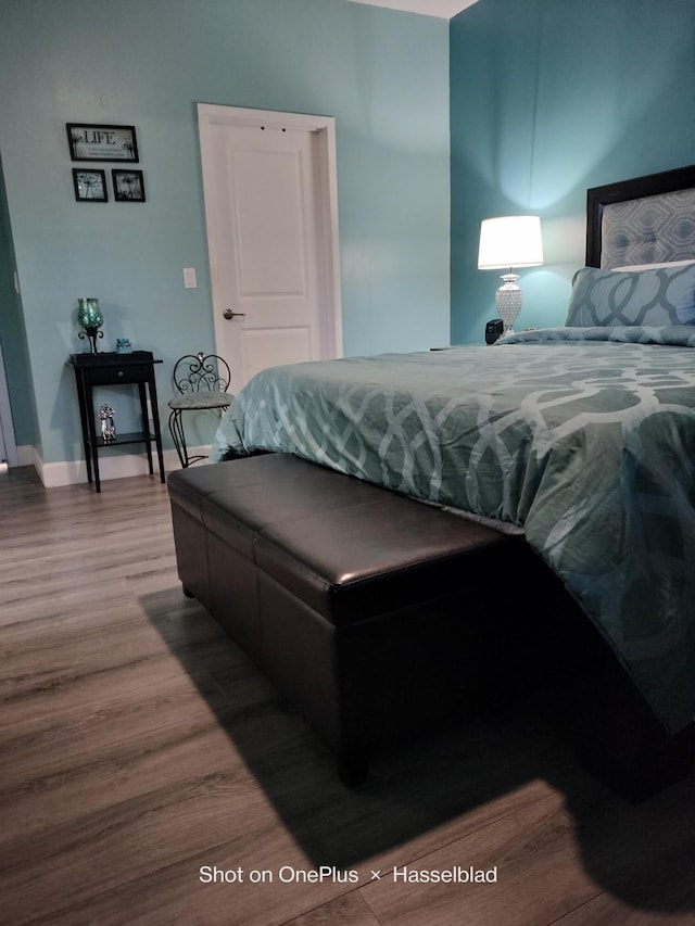 bedroom featuring hardwood / wood-style flooring