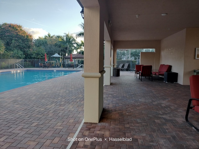 view of pool with a patio