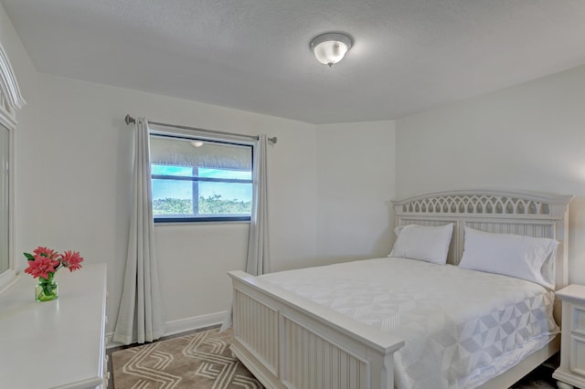 bedroom with a textured ceiling