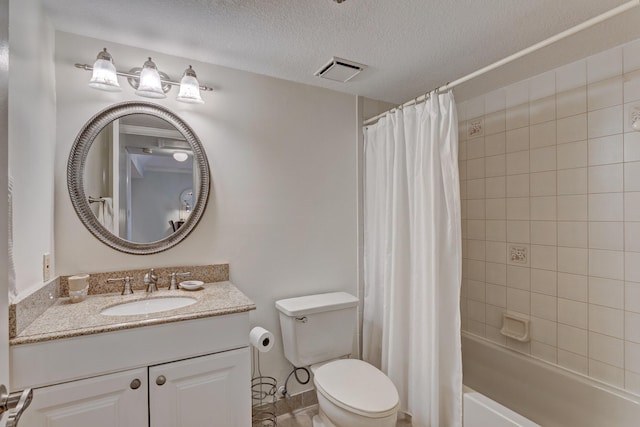 full bathroom featuring vanity, toilet, a textured ceiling, and shower / bath combo