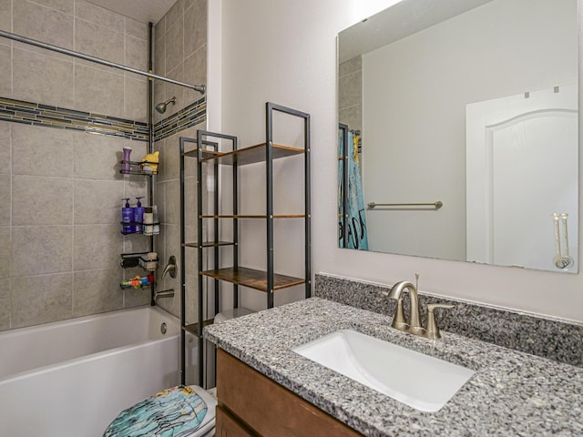 bathroom featuring vanity and tiled shower / bath combo