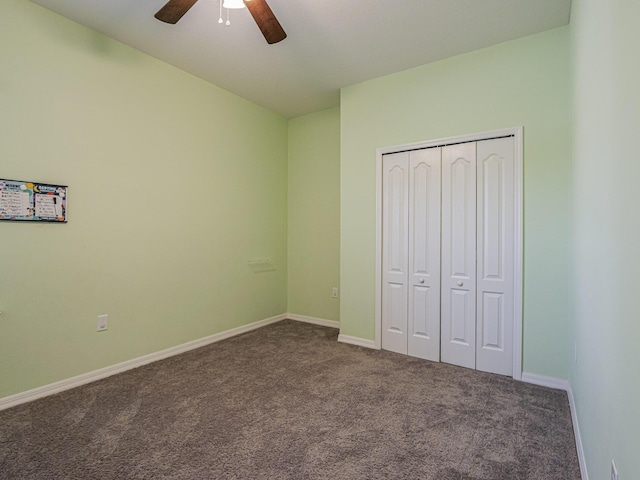 unfurnished bedroom featuring a closet, ceiling fan, and carpet flooring