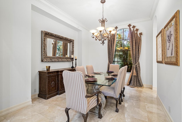 dining area with crown molding and a notable chandelier