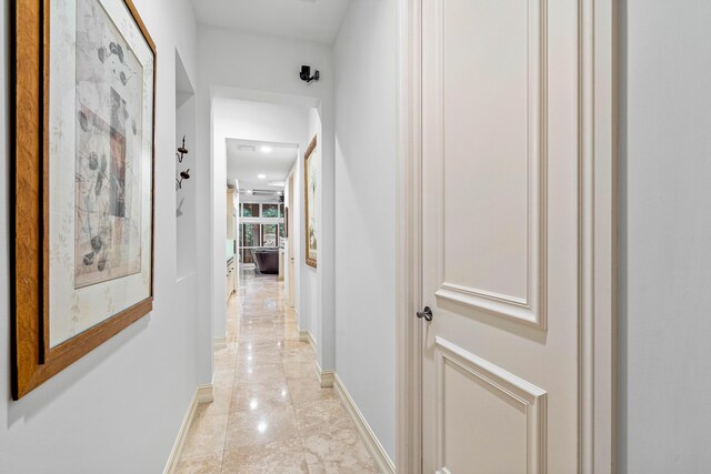 office featuring coffered ceiling, light hardwood / wood-style floors, and ceiling fan