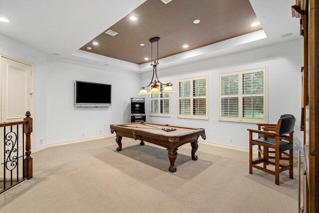 carpeted bedroom with ceiling fan and ornamental molding