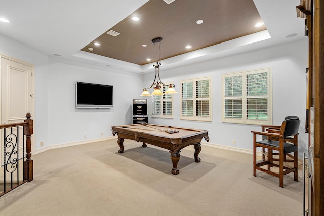 rec room with light carpet, a tray ceiling, and billiards