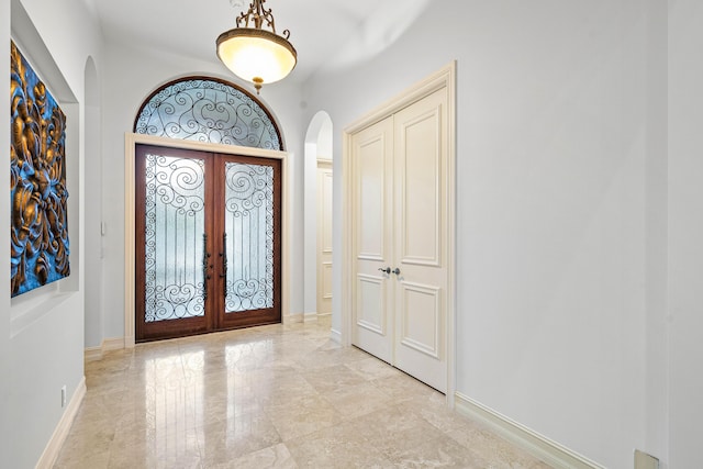 entrance foyer featuring french doors