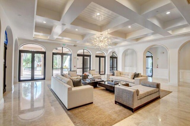 interior space featuring french doors, ornamental molding, and light hardwood / wood-style flooring