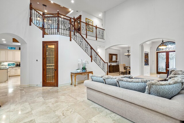 dining room with beamed ceiling, coffered ceiling, sink, and ceiling fan