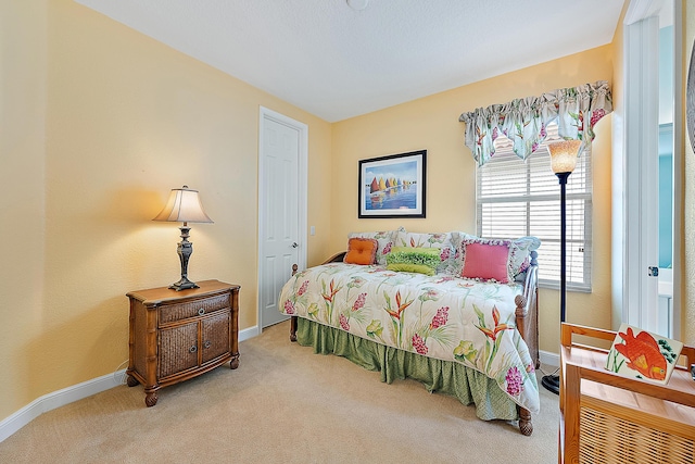 bedroom featuring carpet flooring