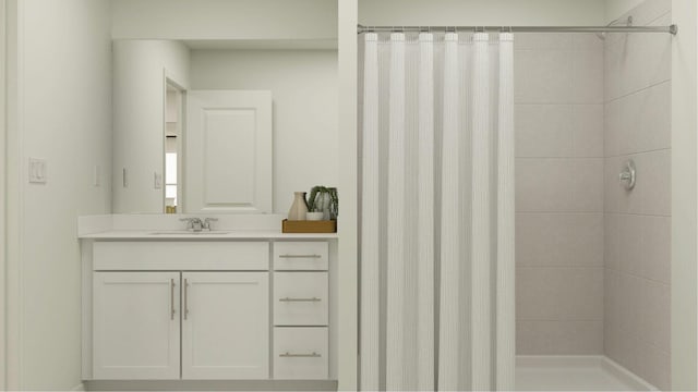 bathroom featuring vanity and tiled shower