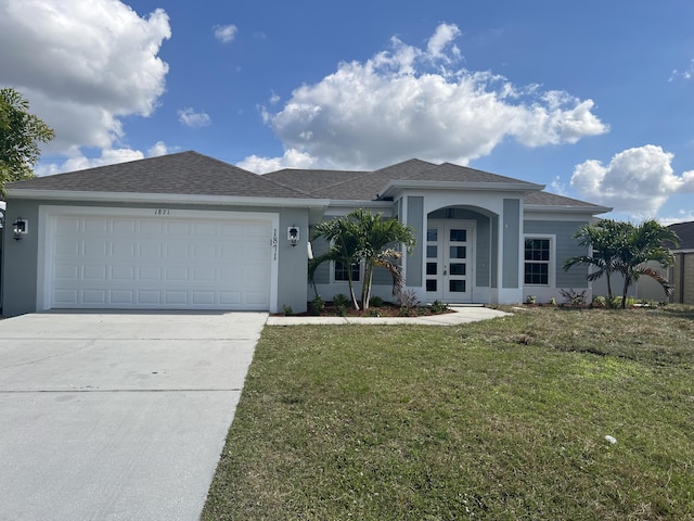 ranch-style house with a garage and a front yard