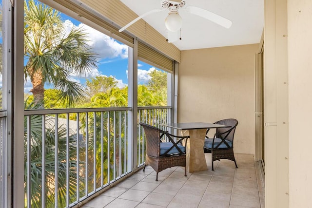 balcony with a sunroom and ceiling fan