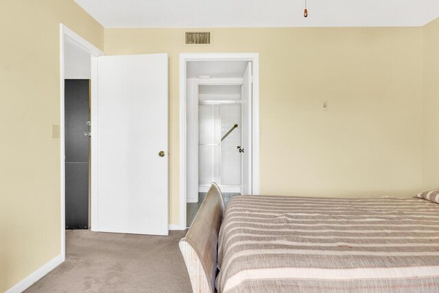 bedroom with light carpet, access to exterior, and ceiling fan