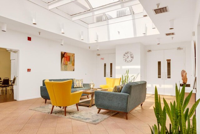 dining area with hardwood / wood-style floors and ceiling fan