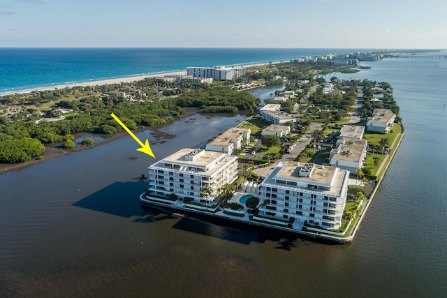 birds eye view of property featuring a water view