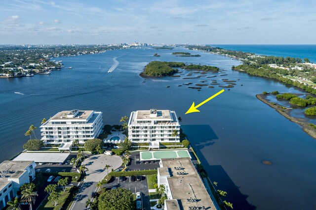 birds eye view of property featuring a water view