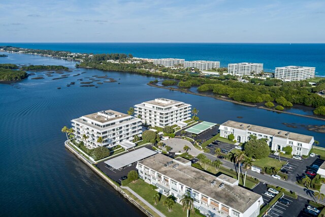 birds eye view of property featuring a water view