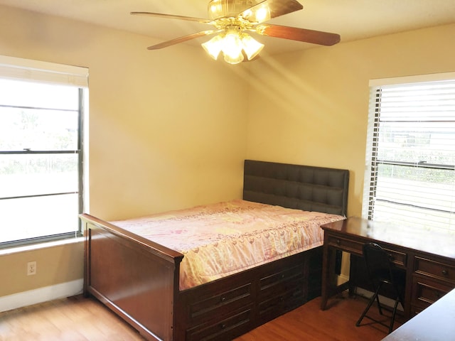 bedroom featuring ceiling fan and light hardwood / wood-style floors