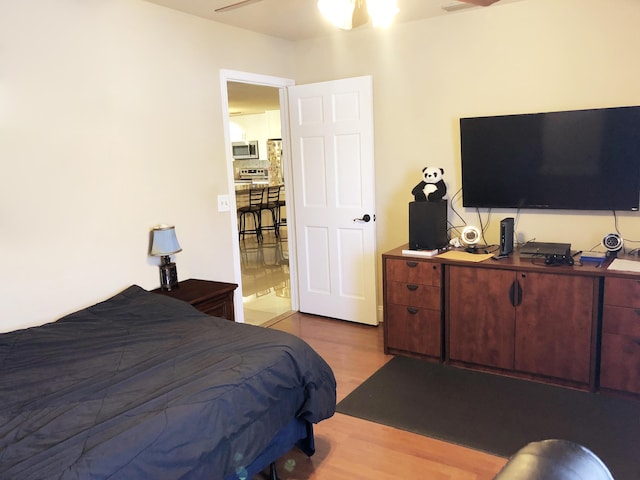 bedroom with wood-type flooring