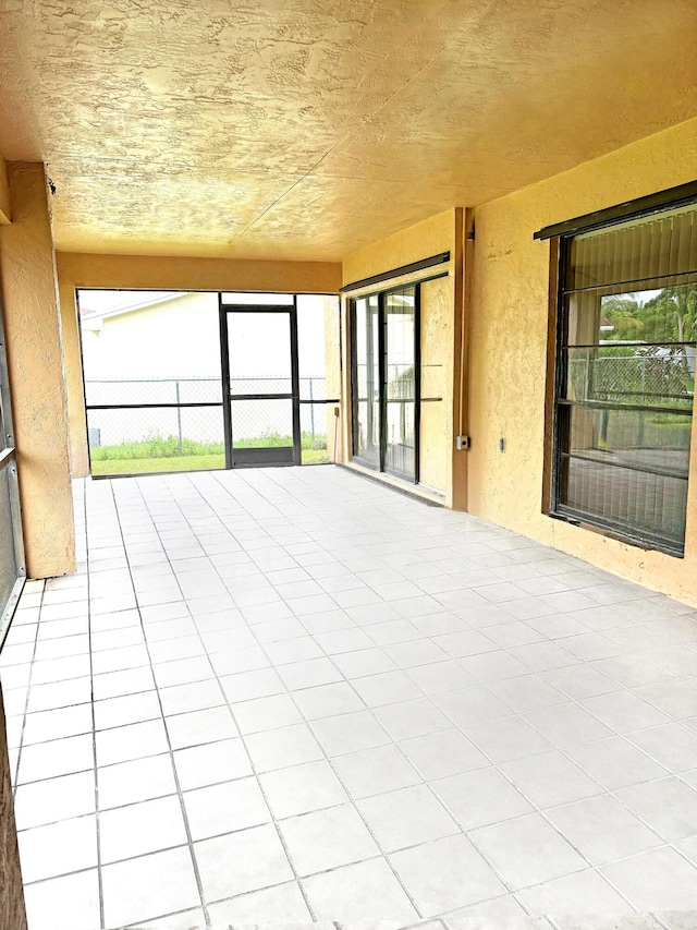 view of unfurnished sunroom