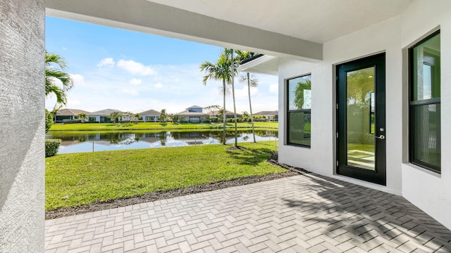 view of patio / terrace featuring a water view