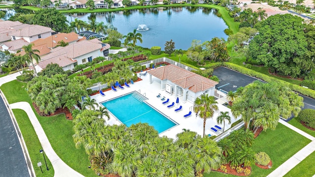 aerial view with a residential view and a water view