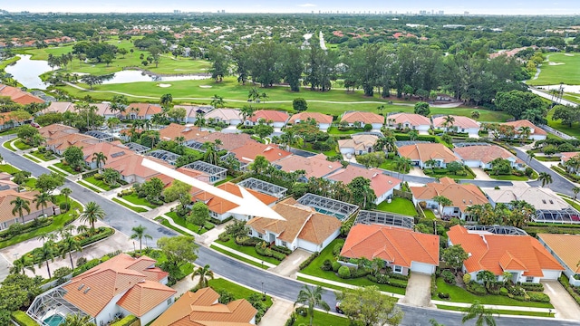 aerial view featuring view of golf course and a residential view