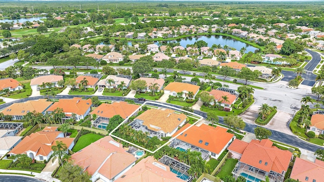 aerial view featuring a residential view and a water view