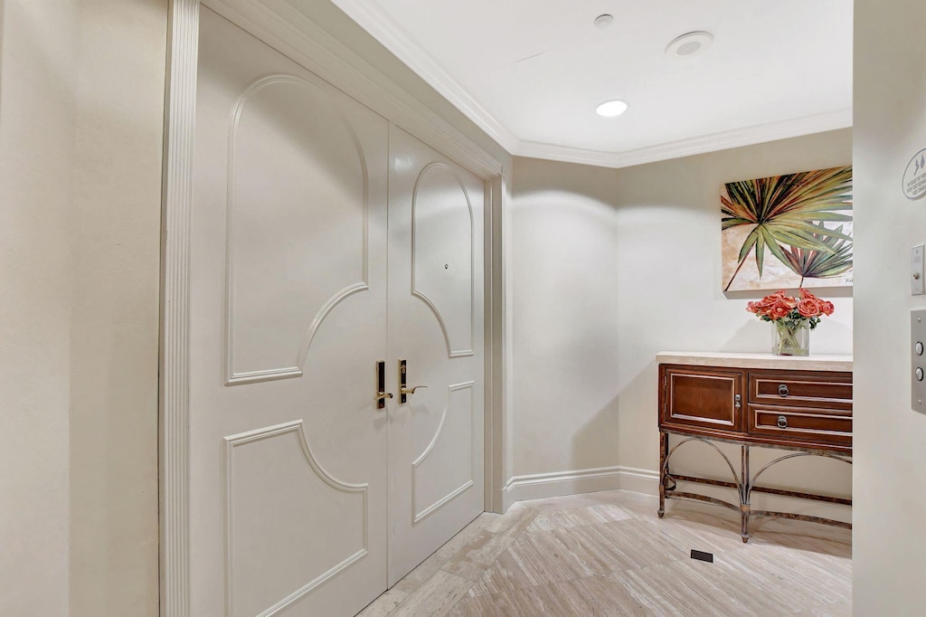 entrance foyer with ornamental molding