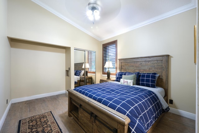 bedroom featuring crown molding, ceiling fan, dark hardwood / wood-style flooring, and vaulted ceiling