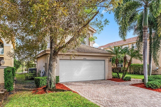 view of front of property featuring a garage