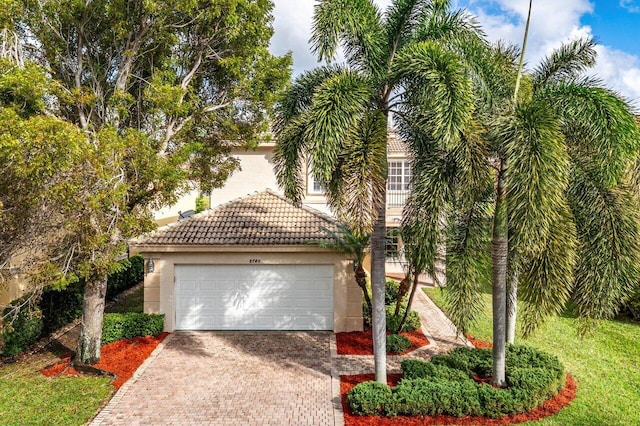 view of front of property with a garage