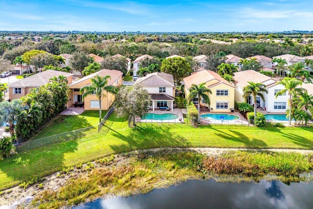 drone / aerial view with a water view