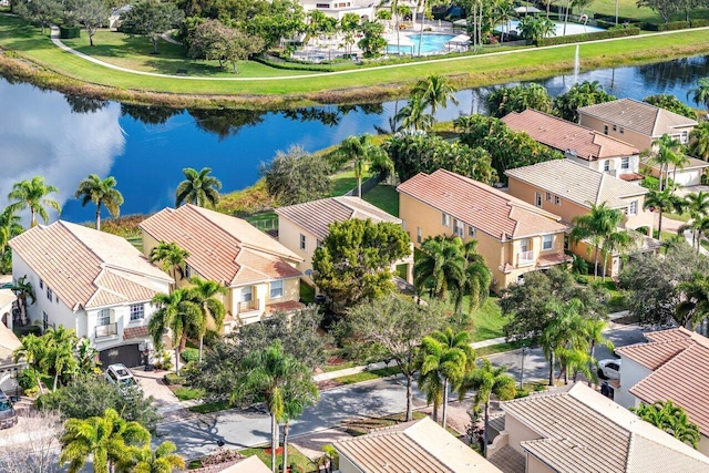 bird's eye view with a water view