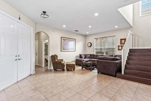 living room with light tile patterned floors