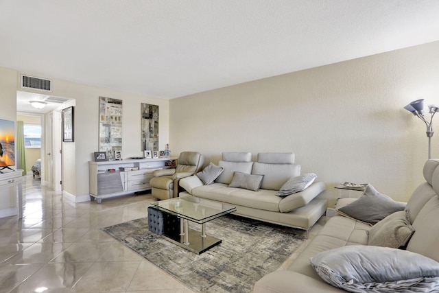 living room featuring light tile patterned floors