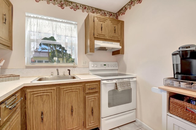 kitchen with light tile patterned flooring, sink, and electric range