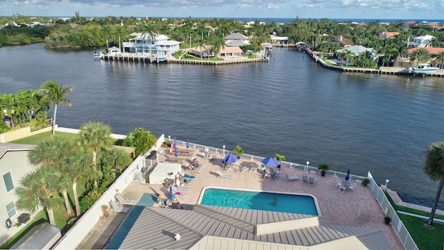 birds eye view of property with a residential view and a water view