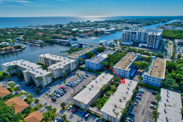 birds eye view of property featuring a water view